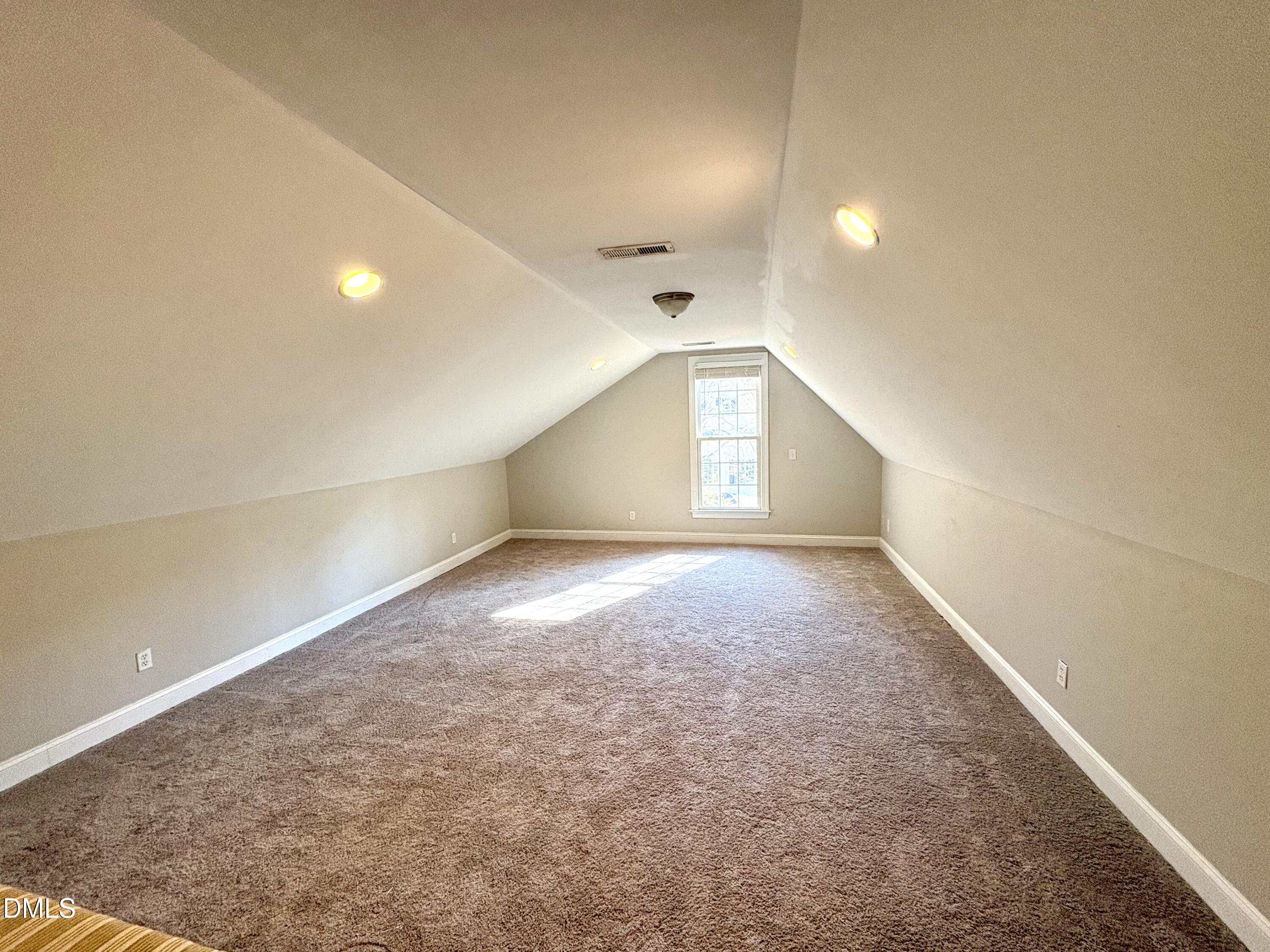 3304 Drexel Hill Court Apex, NC 27539 - Photo 16 of 20 an empty room with a empty space and windows