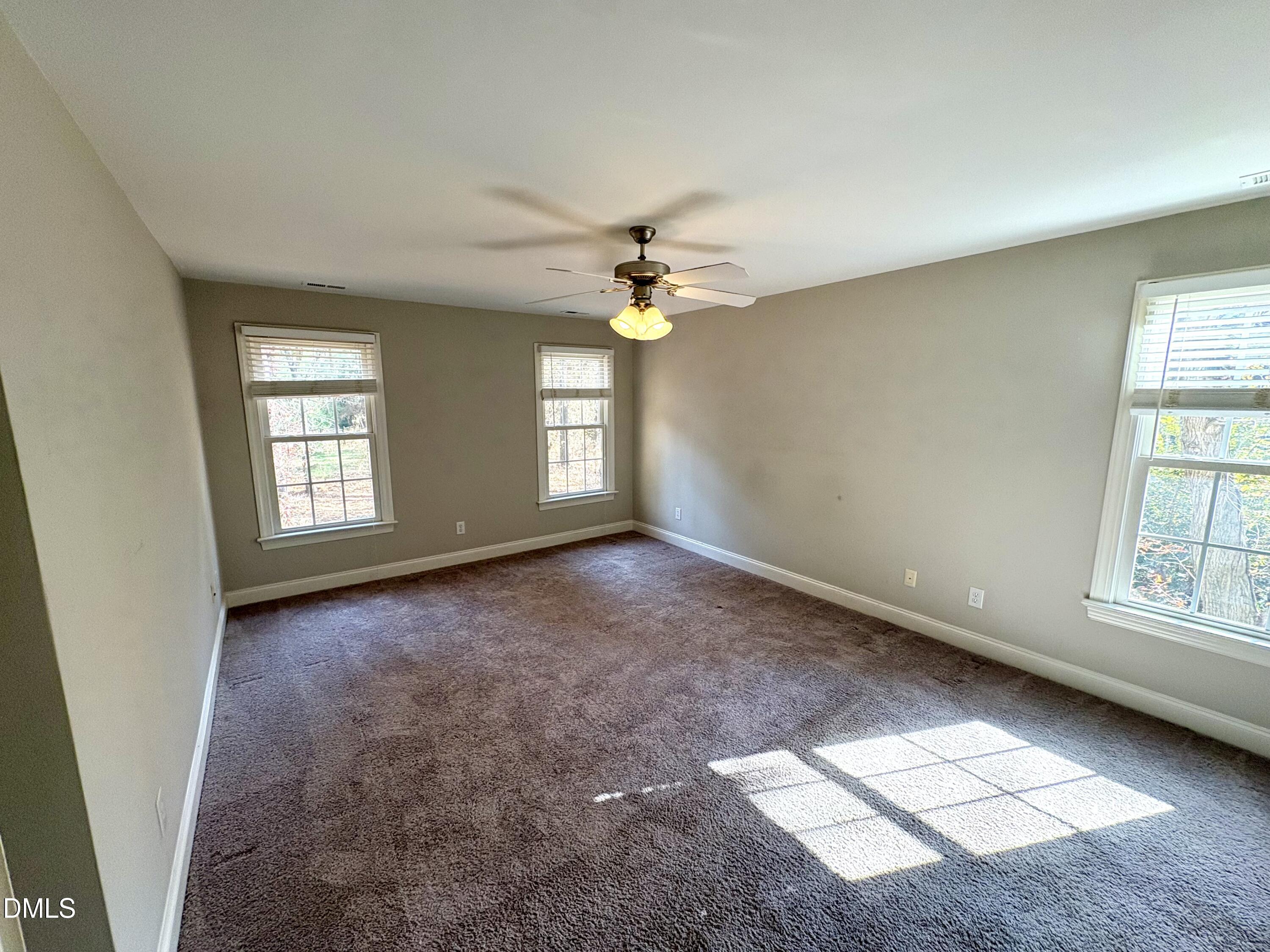 3304 Drexel Hill Court Apex, NC 27539 - Photo 7 of 20 a view of an empty room with a window