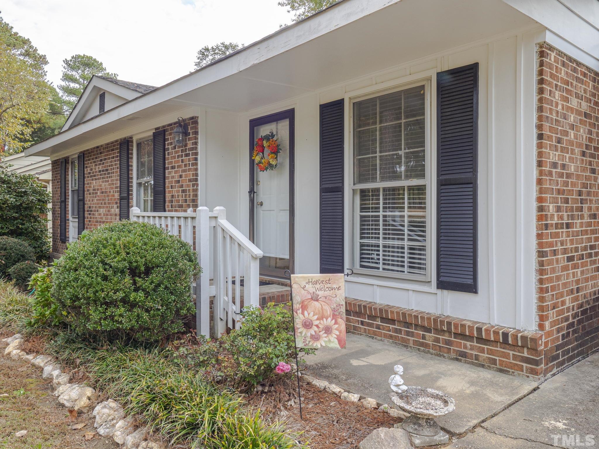 6400 Buffaloe Road Raleigh, NC 27604 - Photo 2 of 25 a front view of a house with a yard