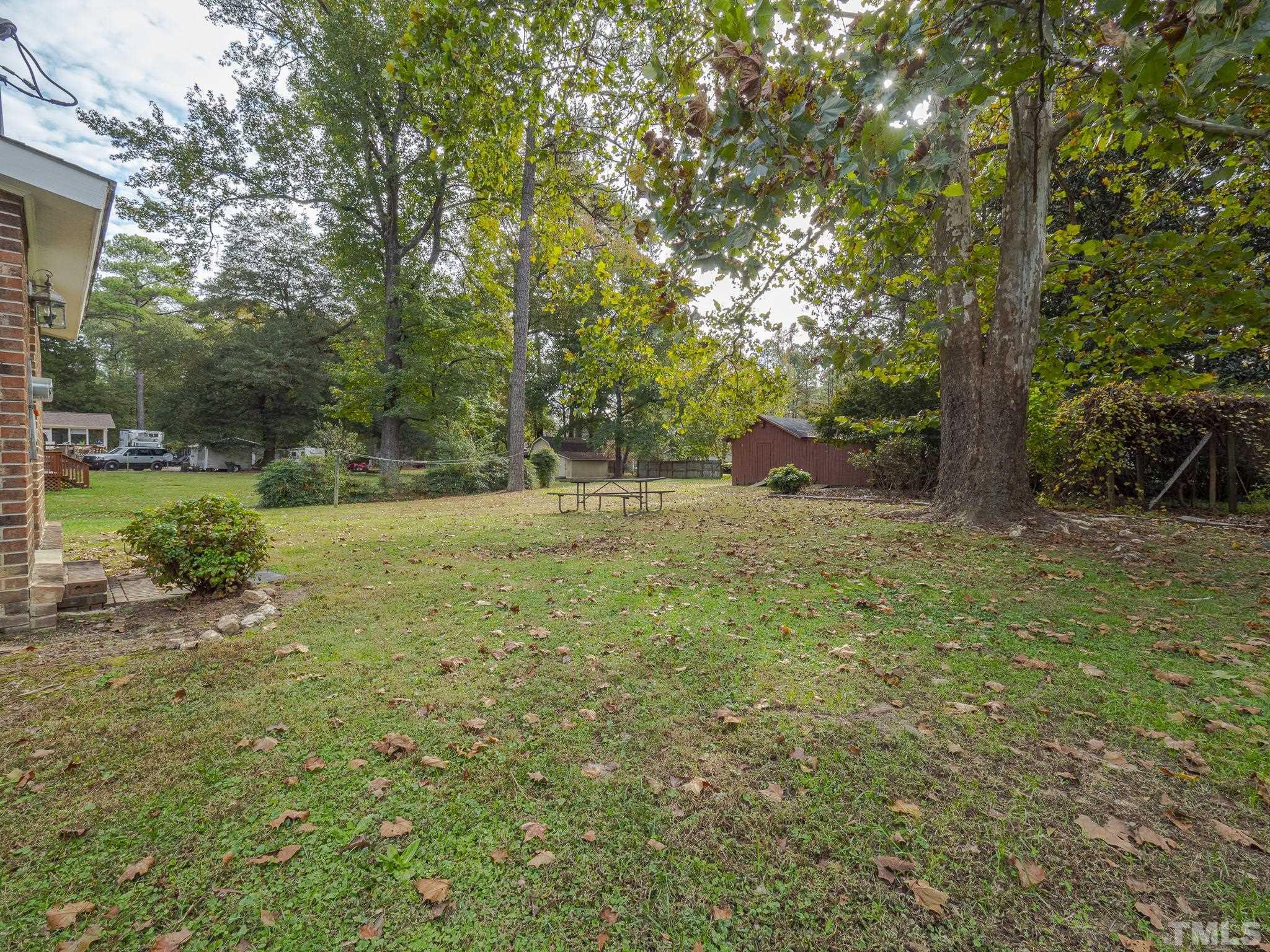 6400 Buffaloe Road Raleigh, NC 27604 - Photo 20 of 25 a view of outdoor space with deck and yard
