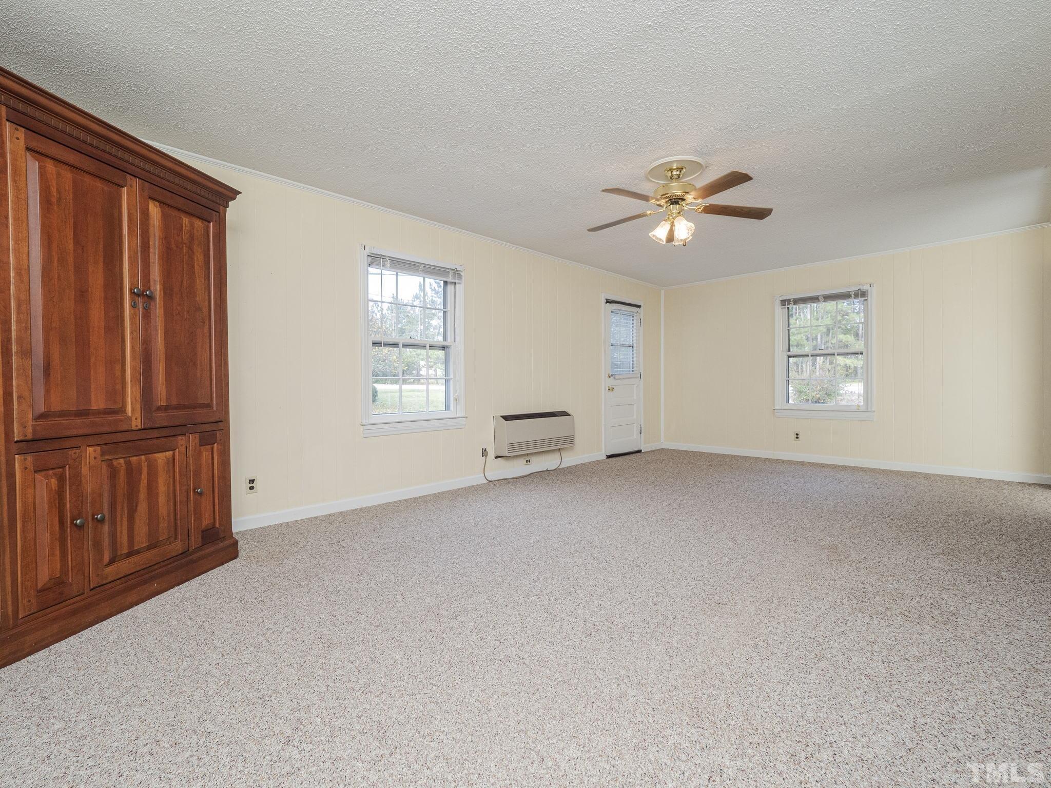 6400 Buffaloe Road Raleigh, NC 27604 - Photo 3 of 25 a view of an empty room with a window