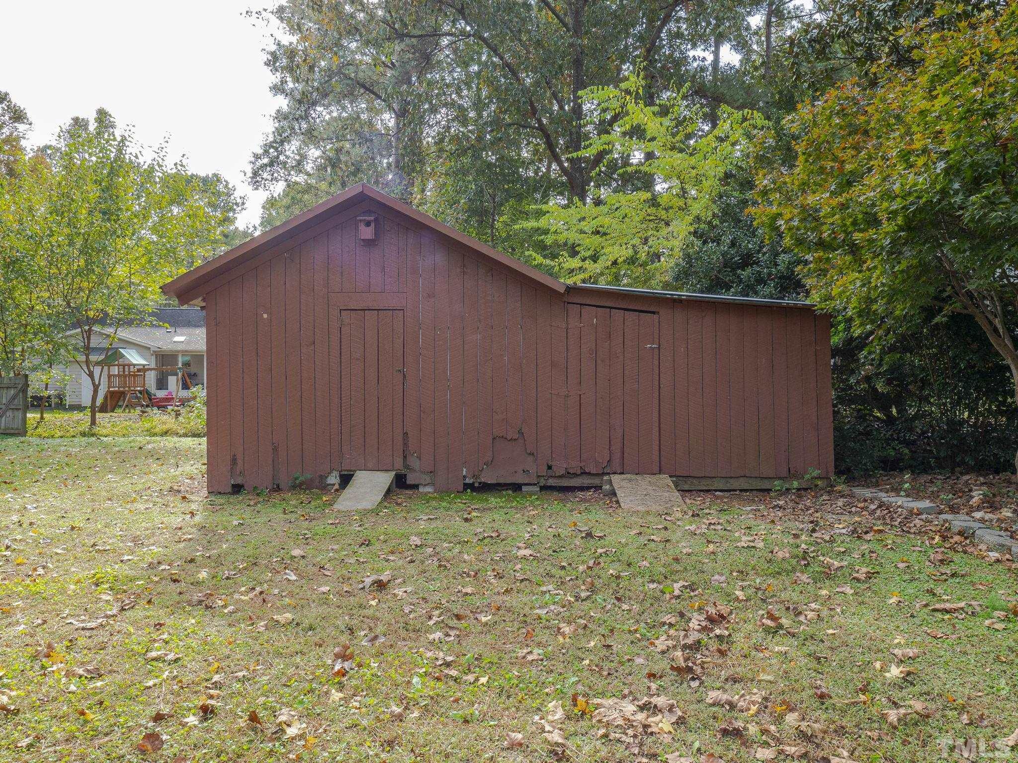 6400 Buffaloe Road Raleigh, NC 27604 - Photo 24 of 25 a view of a backyard