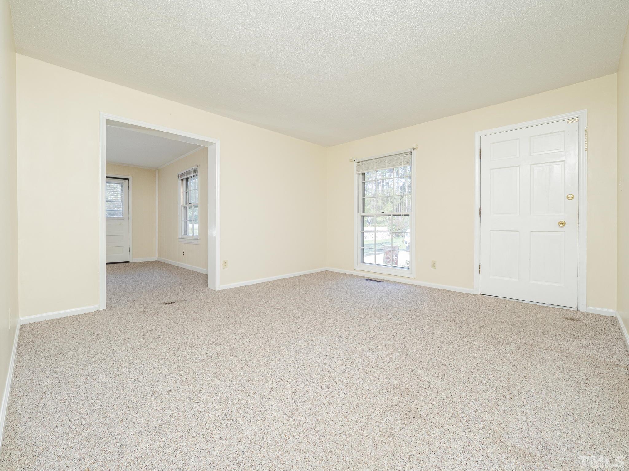 6400 Buffaloe Road Raleigh, NC 27604 - Photo 8 of 25 a view of an empty room with a window