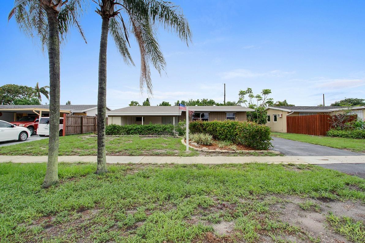 79 Andros Road Palm Springs, FL 33461 - Photo 11 of 11 2_facade_image2