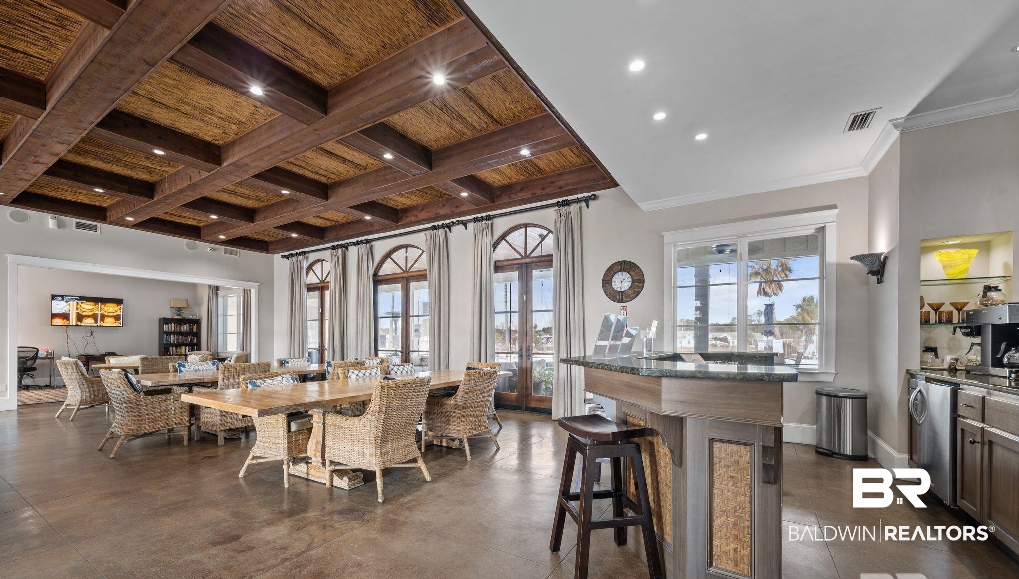 12041 Raptor Court Elberta, AL 36530 - Photo 24 of 32 Dining space with plenty of natural light, finished concrete floors, recessed lighting, a wood ceiling with exposed beams, and coffered ceiling
