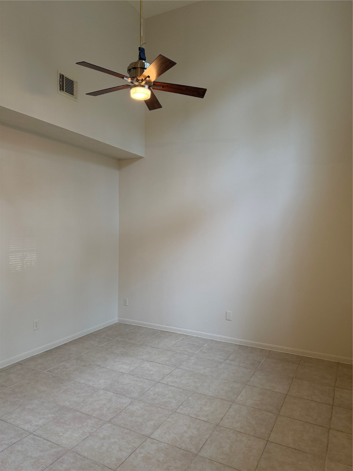 4738 Stoney Point Court Sugar Land, TX 77479 - Photo 2 of 20 a view of a room with a ceiling fan and a fan