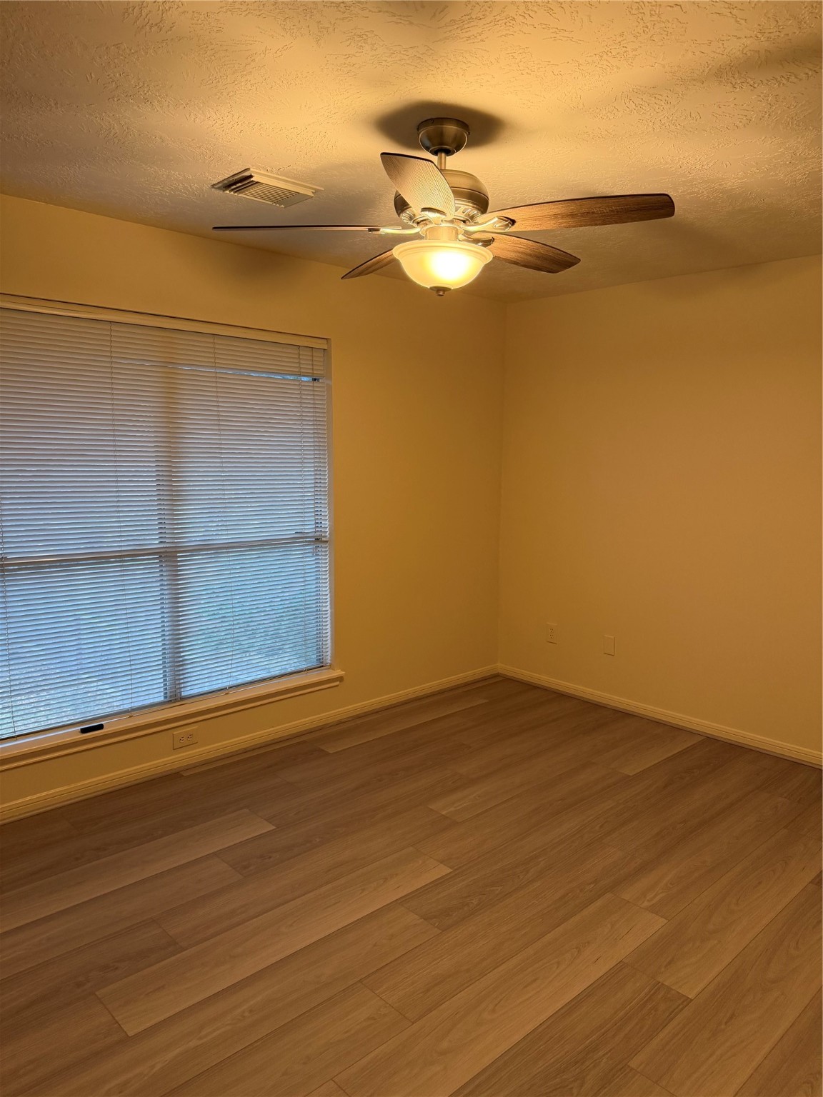 4738 Stoney Point Court Sugar Land, TX 77479 - Photo 8 of 20 a view of a room with wooden floor