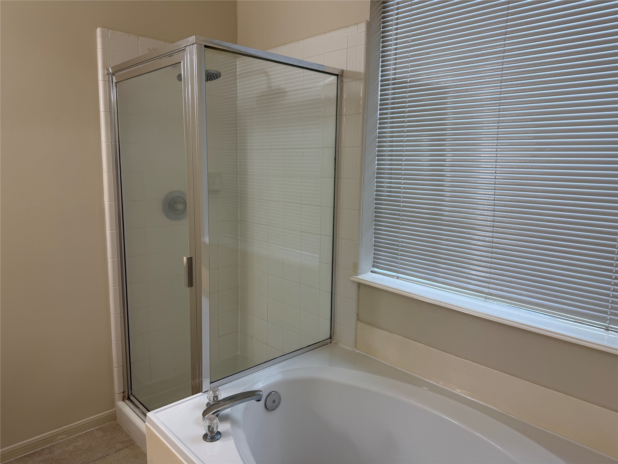 4738 Stoney Point Court Sugar Land, TX 77479 - Photo 10 of 20 a bathroom with a tub and shower