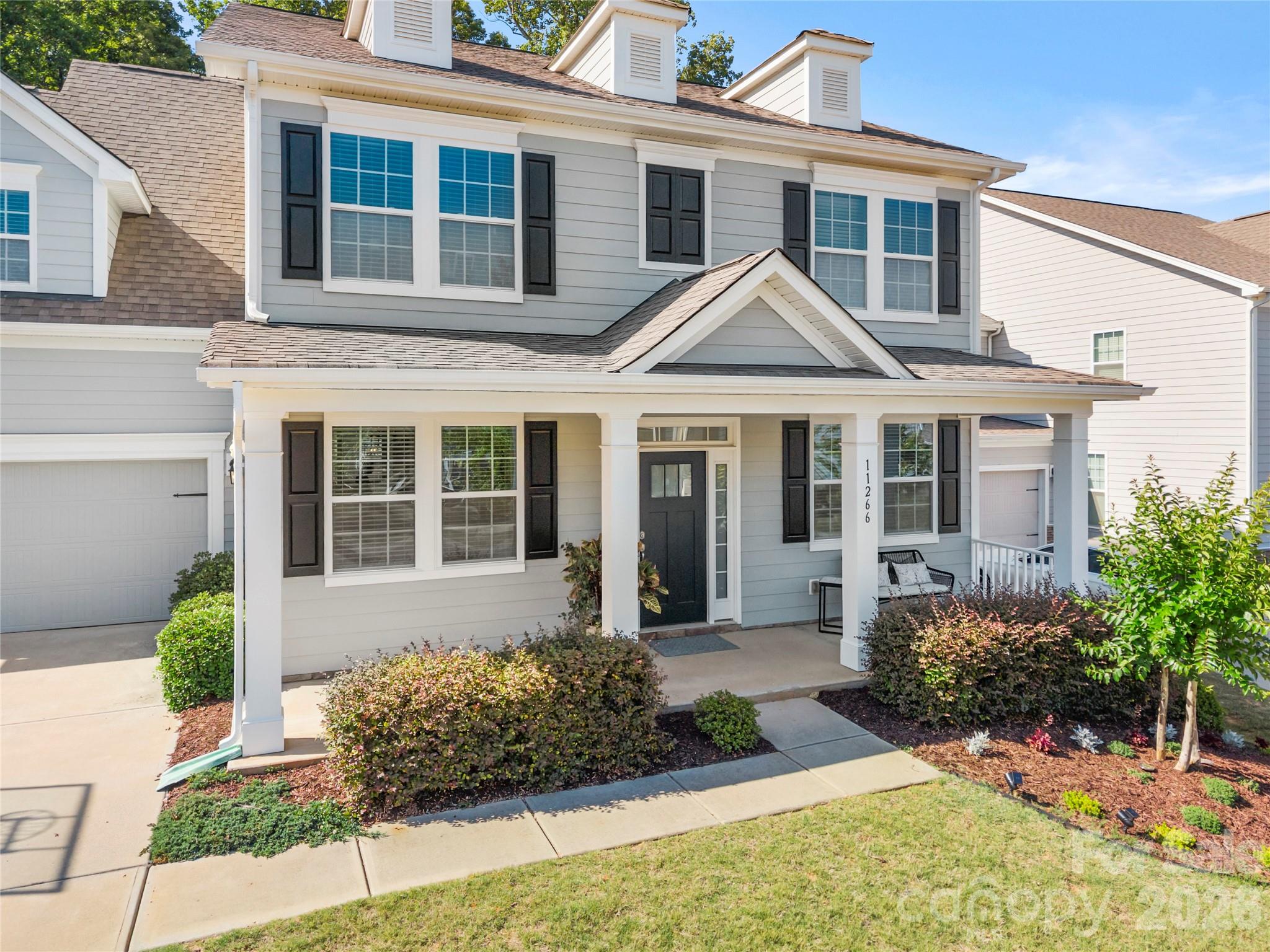 11266 Trailside Road Concord, NC 28027 - Photo 3 of 48 front view of a house with a yard
