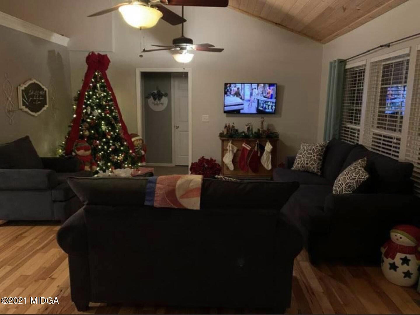 1365 Bass Road Macon, GA 31210 - Photo 2 of 15 a living room with furniture and a window