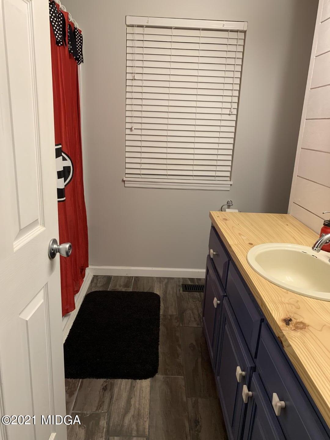1365 Bass Road Macon, GA 31210 - Photo 15 of 15 a room with storage and utility