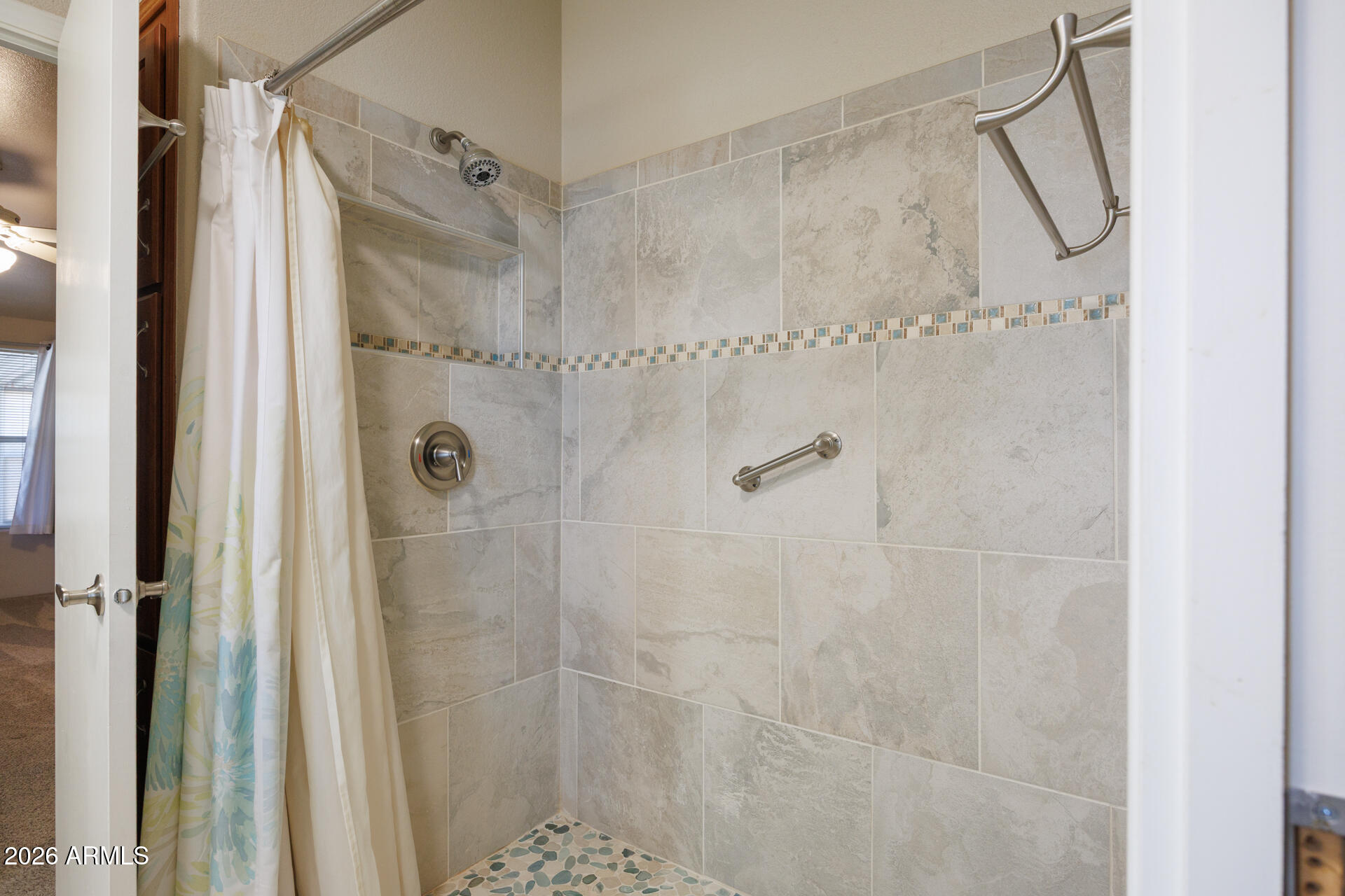 155 East Rodeo Road, Unit 77 Casa Grande, AZ 85122 - Photo 11 of 26 a bathroom with a shower