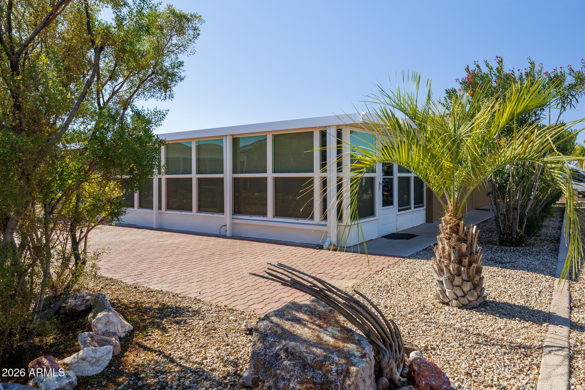155 East Rodeo Road, Unit 77 Casa Grande, AZ 85122 - Photo 21 of 26 a house view with a backyard space