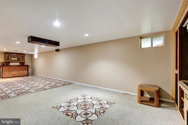 a view of a livingroom with wooden floor