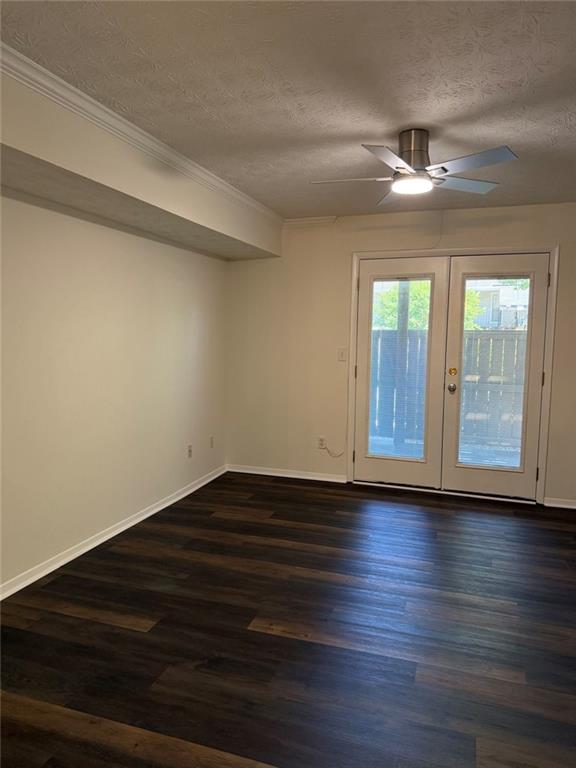 319 Park Ridge Circle Marietta, GA 30068 - Photo 15 of 32 a view of an empty room with wooden floor and a window