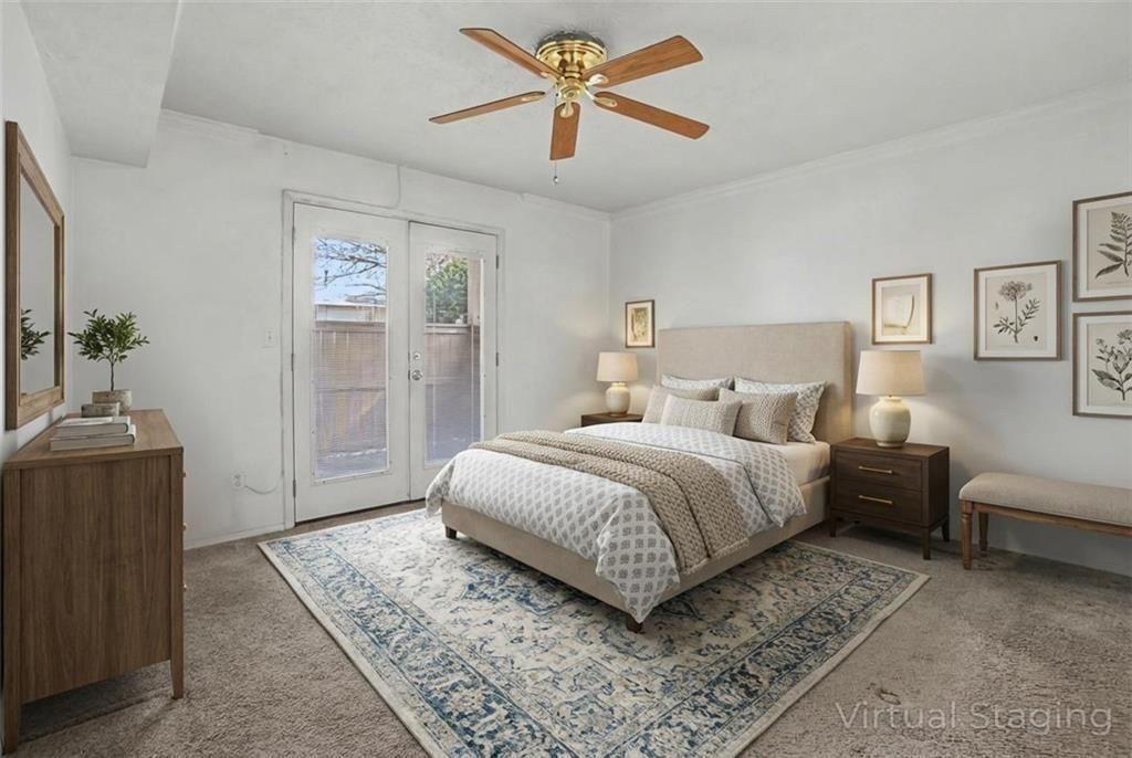 319 Park Ridge Circle Marietta, GA 30068 - Photo 16 of 32 a bedroom with a bed a couch and dresser