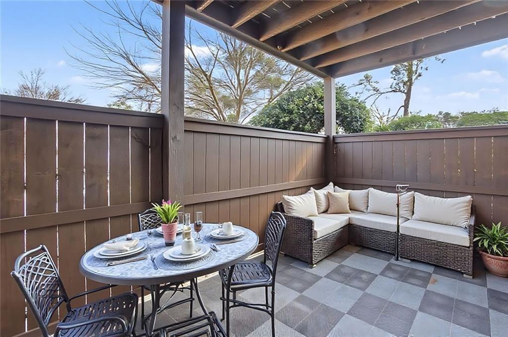 319 Park Ridge Circle Marietta, GA 30068 - Photo 2 of 32 a view of a patio on the roof deck