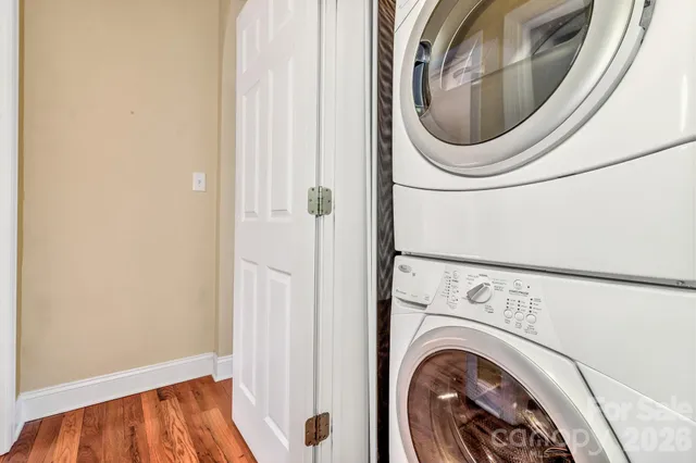 a close view of a utility room with dryer and washer