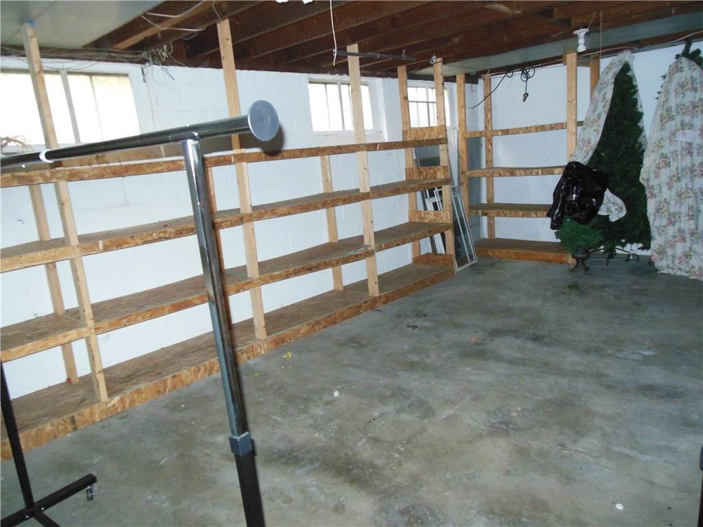 108 Ludwig Road New Castle, PA 16105 - Photo 19 of 20 Storage shelving in basement