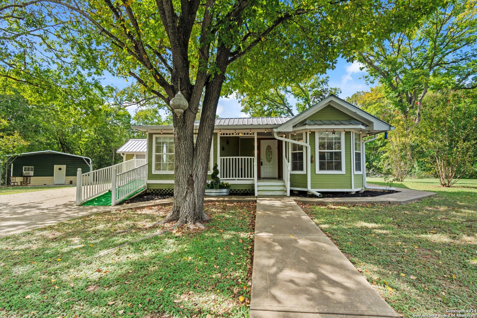 115 Old McDade Road Bastrop, TX 78602 - Photo 1 of 1 a front view of a house with a yard