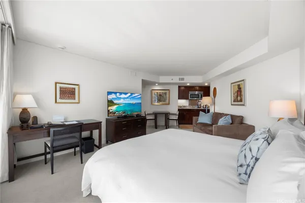 a bed room with a bed and furniture