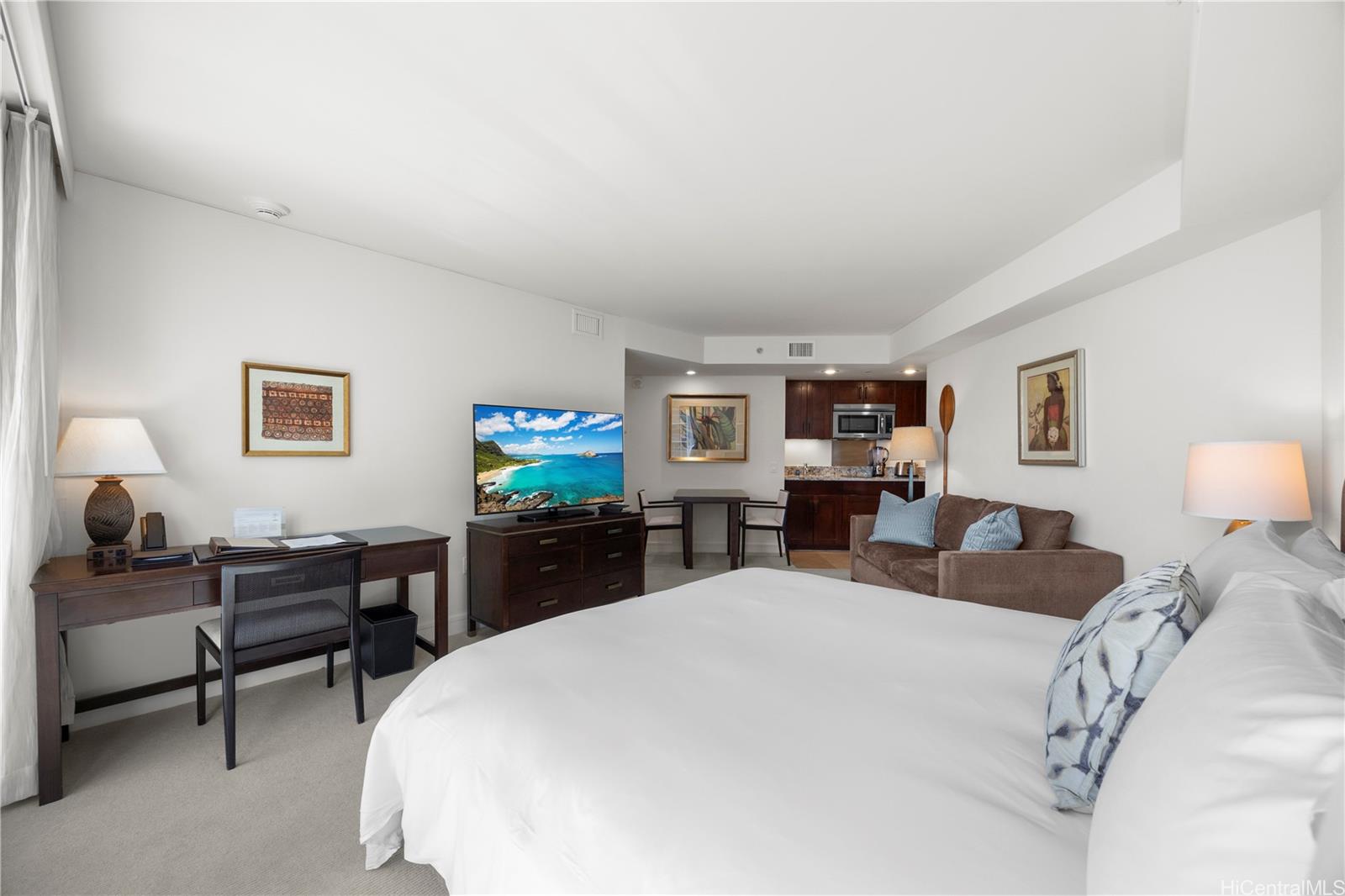 223 Saratoga Road, Unit 1114 Honolulu, HI 96815 - Photo 14 of 23 a bed room with a bed and furniture