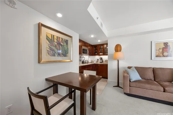 a living room with furniture and a table
