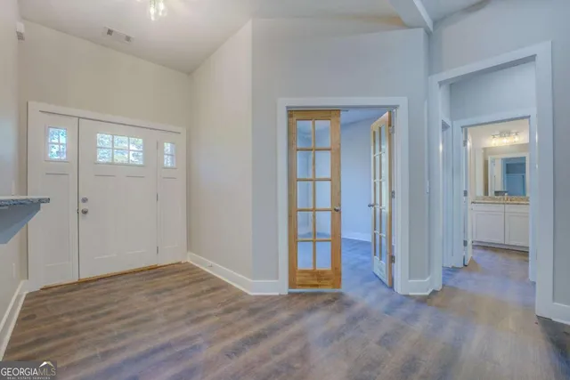 wooden floor and windows in a room