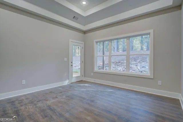 a bathroom with a granite countertop sink mirror and
