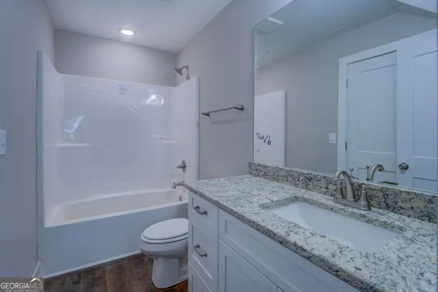 a view of a house with a garage