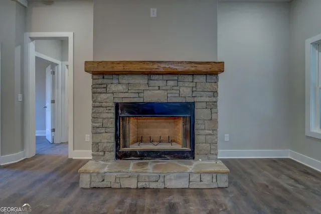 a living room with a fireplace