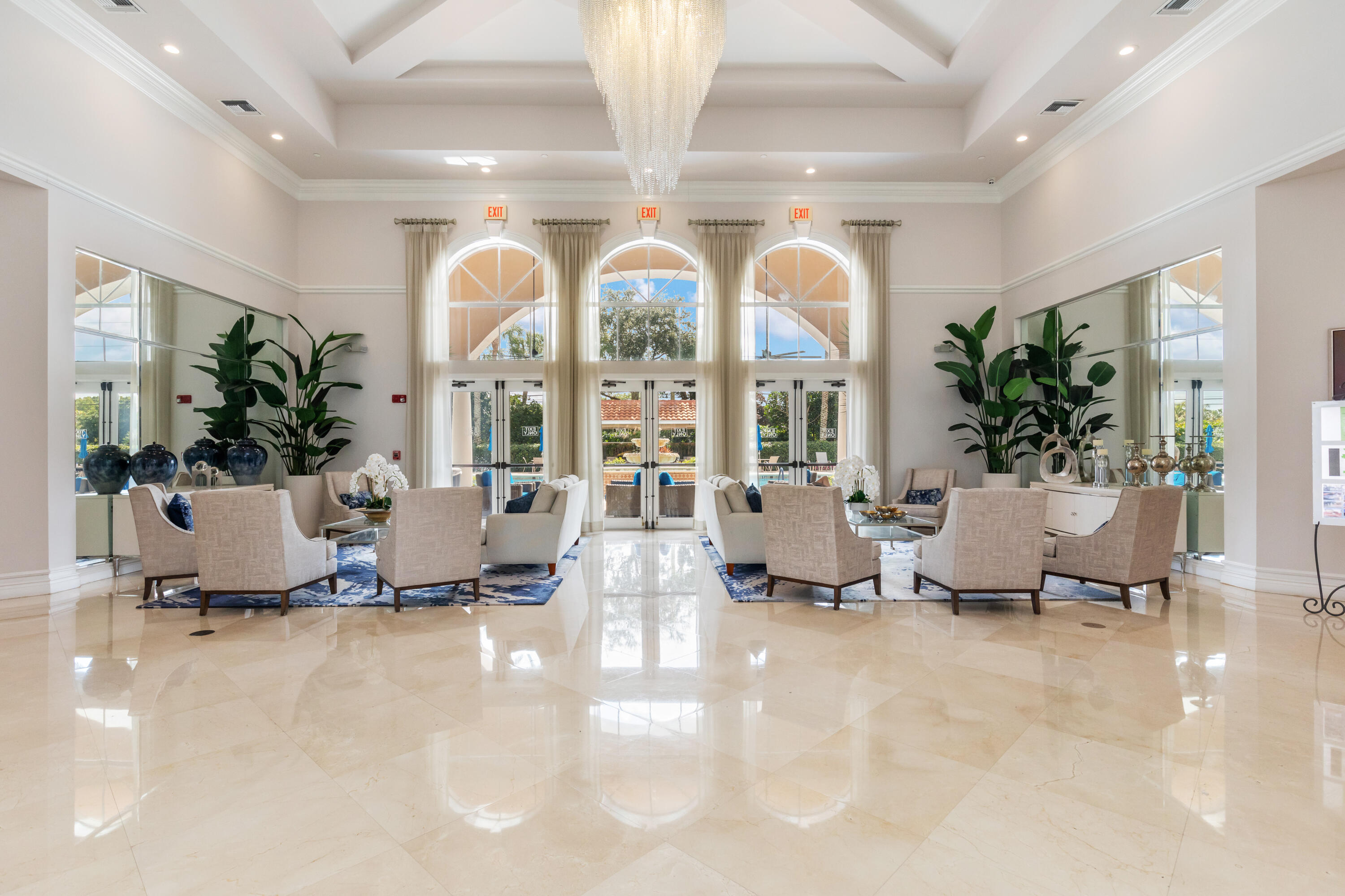 6698 Vía Roma Delray Beach, FL 33446 - Photo 32 of 50 a living room with furniture and a large window