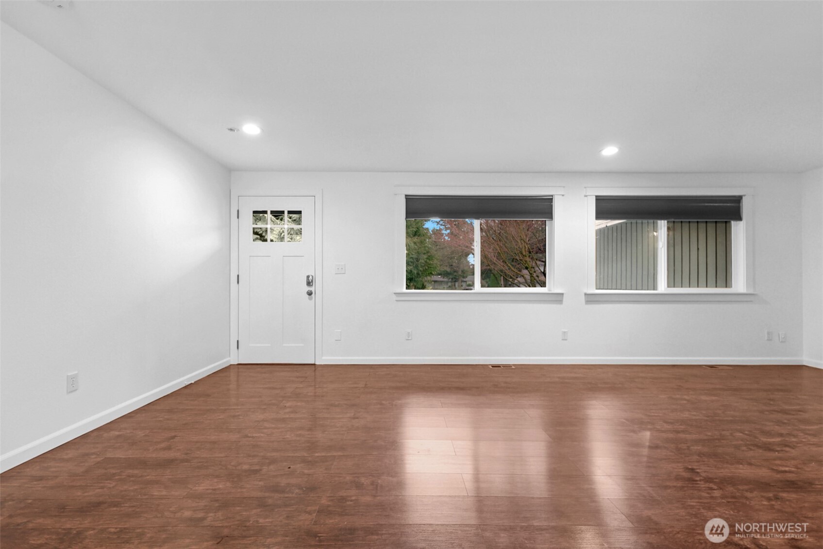 2105 100th Street Southeast Everett, WA 98208 - Photo 14 of 31 a view of empty room with wooden floor and fan