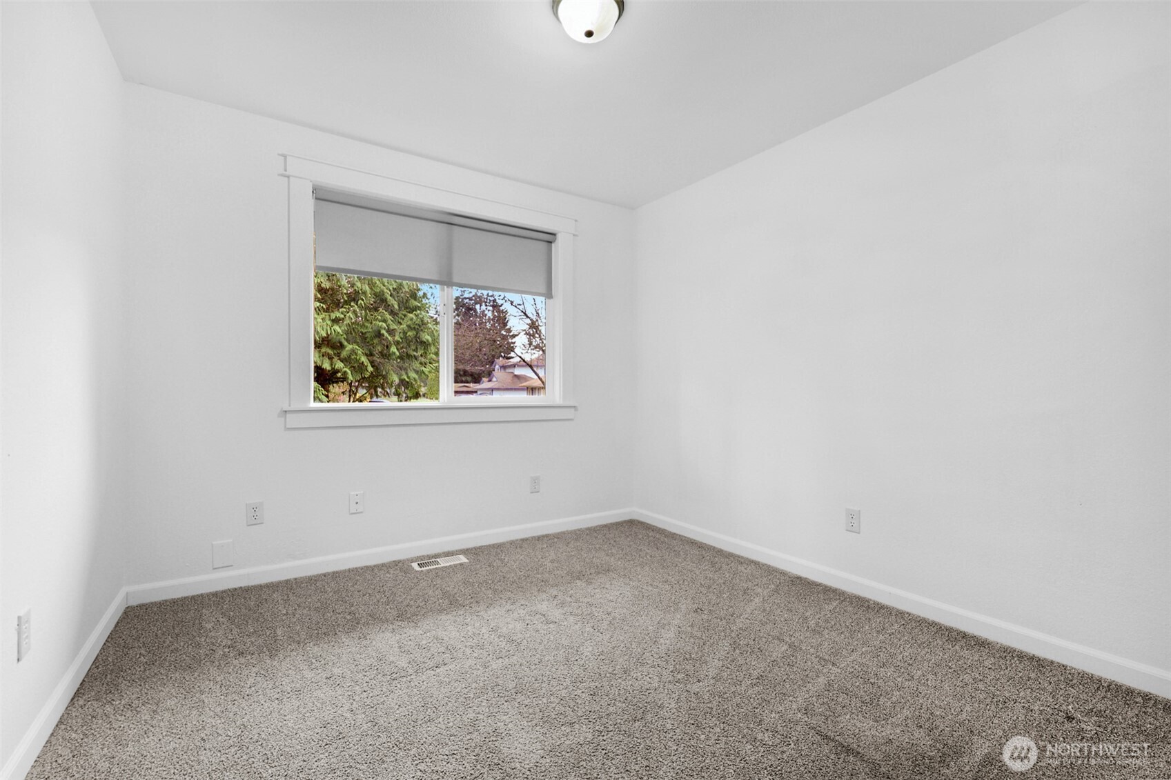2105 100th Street Southeast Everett, WA 98208 - Photo 17 of 31 an empty room with windows