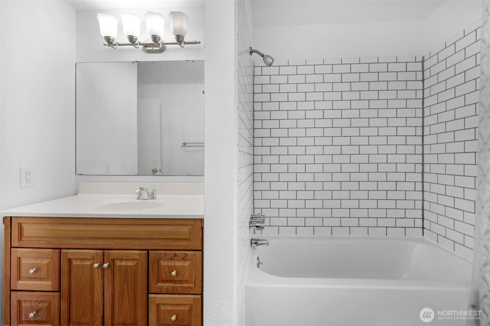 2105 100th Street Southeast Everett, WA 98208 - Photo 20 of 31 a bathroom with a bathtub and shower