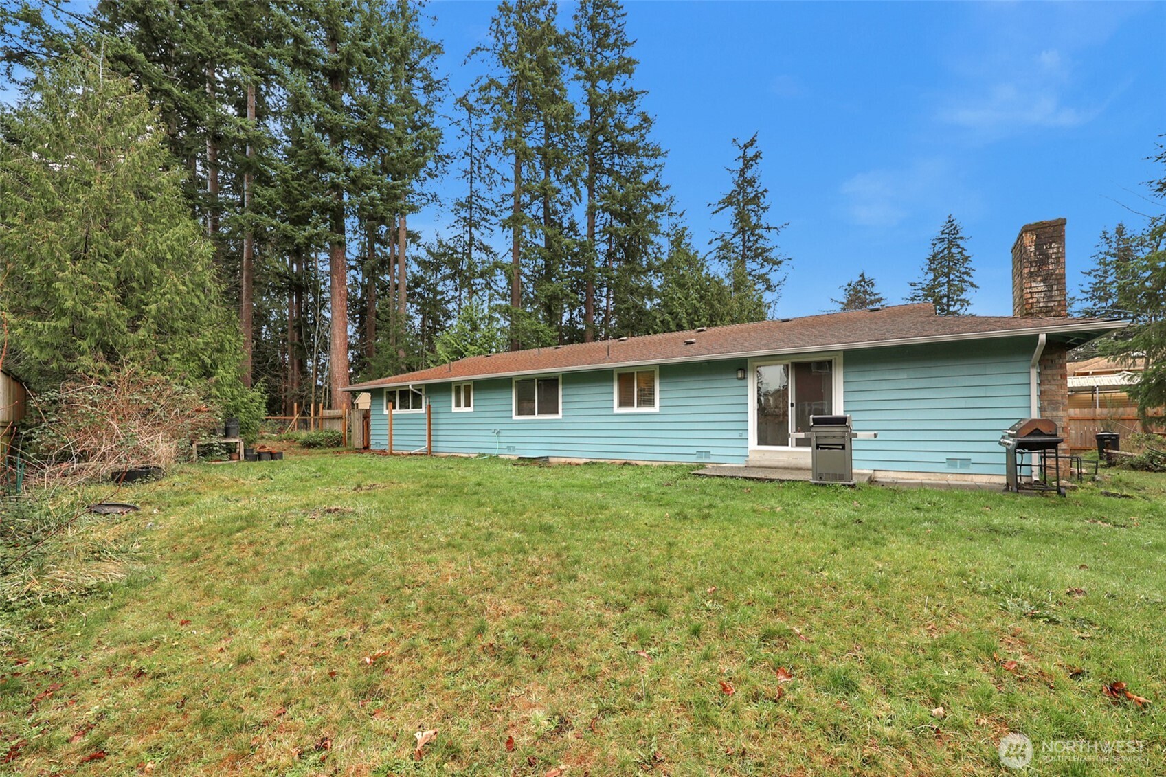 2105 100th Street Southeast Everett, WA 98208 - Photo 30 of 31 a view of a house with a backyard