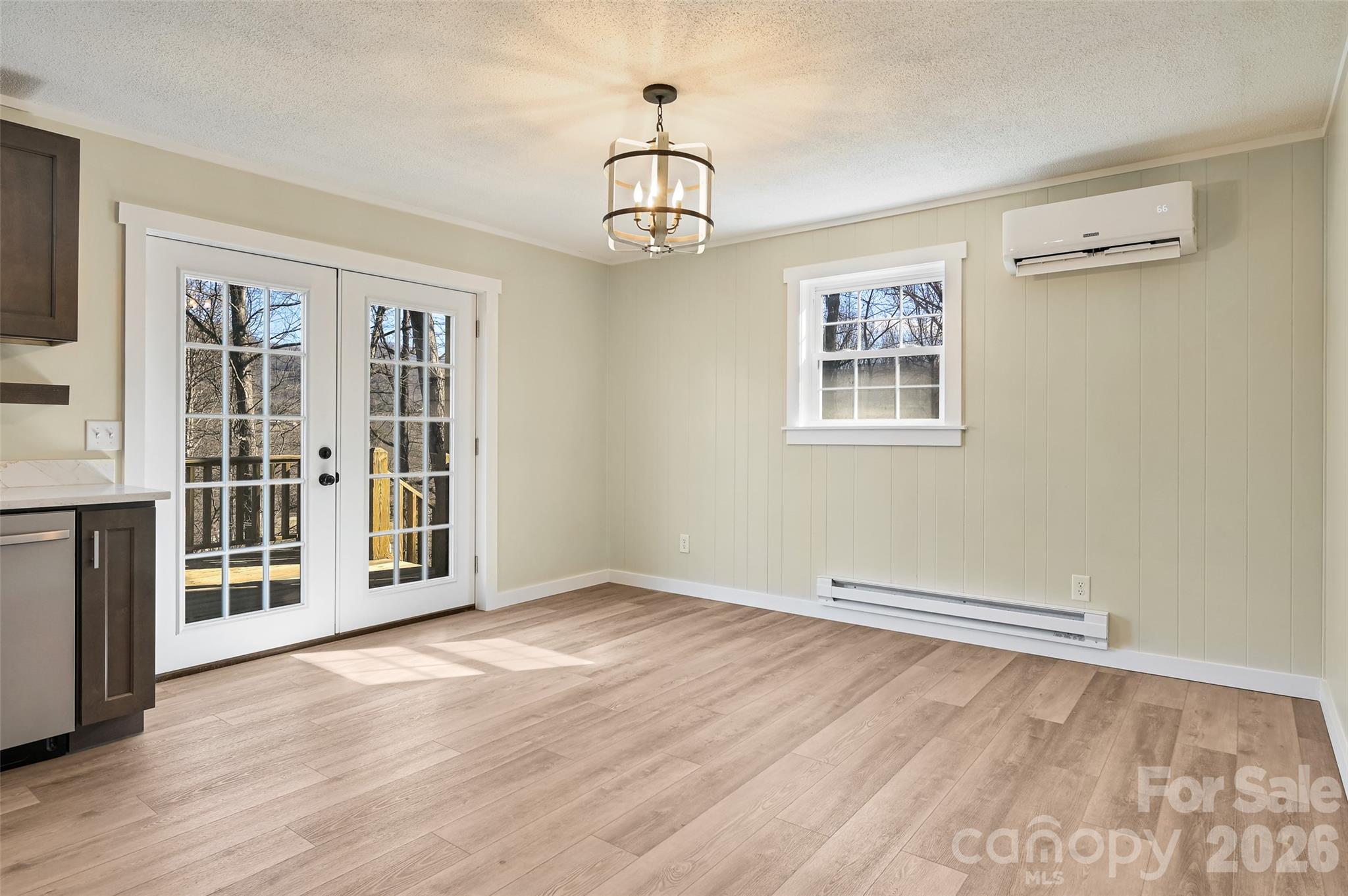 241 Sherrill Lane Canton, NC 28716 - Photo 18 of 39 wooden floor in an empty room with a window