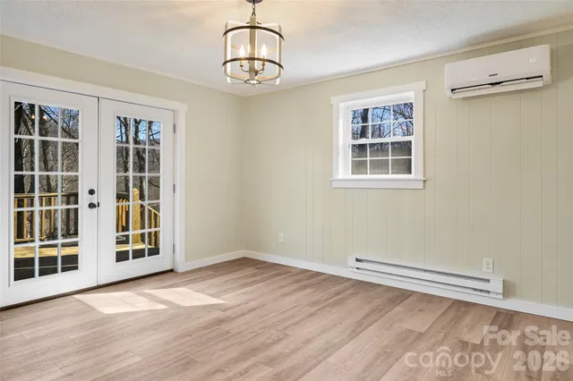 a view of empty room with windows