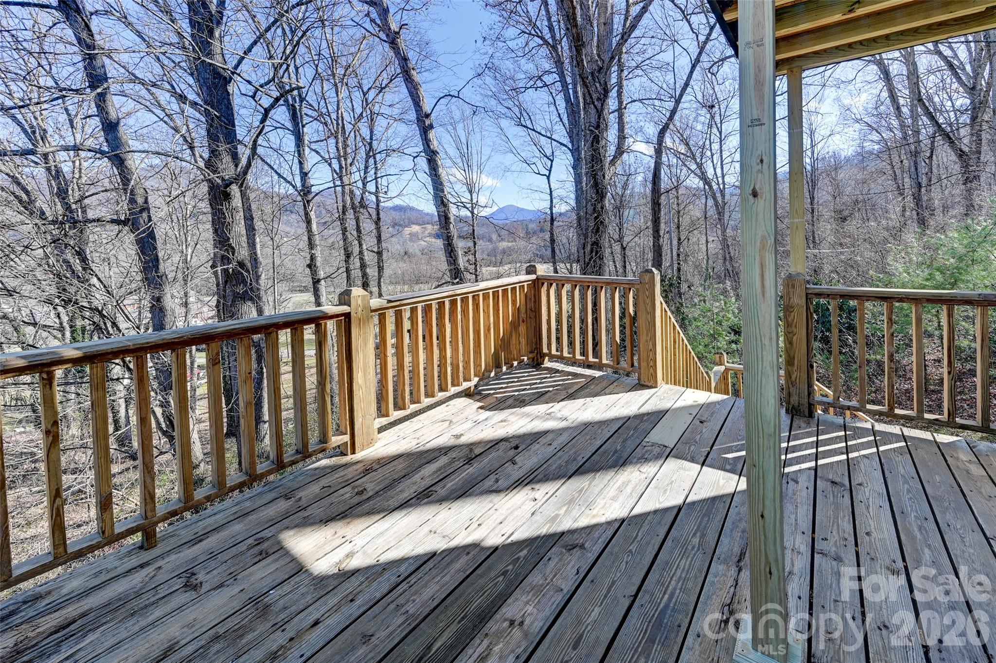 241 Sherrill Lane Canton, NC 28716 - Photo 3 of 39 a view of balcony with wooden floor and fence