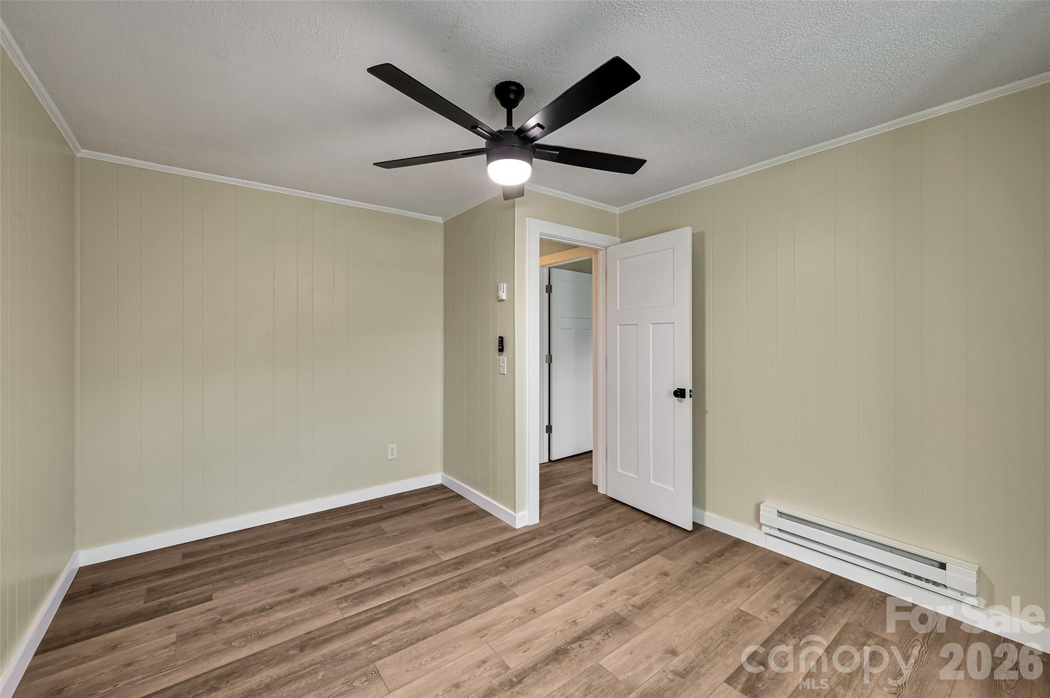 241 Sherrill Lane Canton, NC 28716 - Photo 39 of 39 a view of an empty room with wooden floor