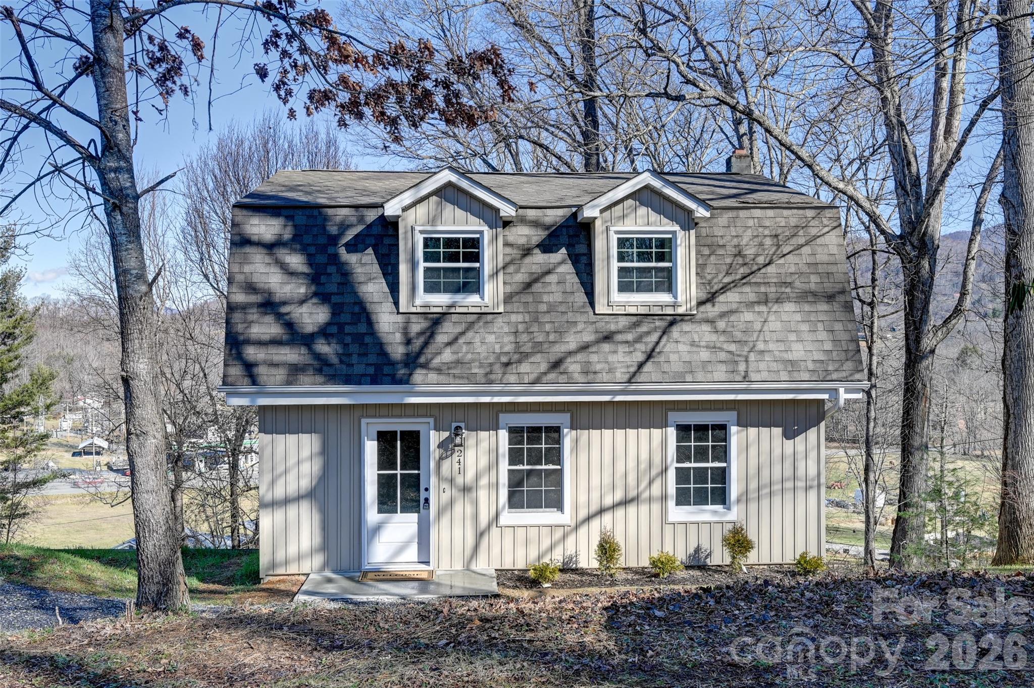 241 Sherrill Lane Canton, NC 28716 - Photo 10 of 39 a front view of a house with a yard