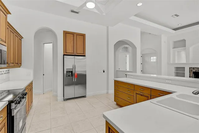 a room with gym equipment and a bath tub