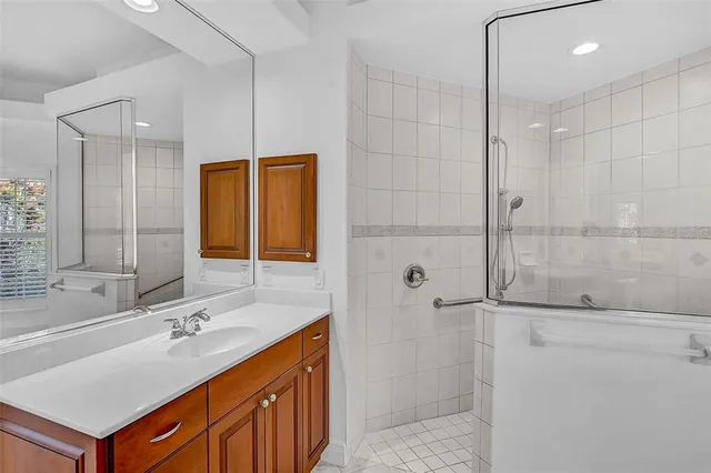 a bathroom with a sink and a shower