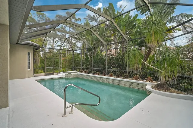 a view of a house with swimming pool
