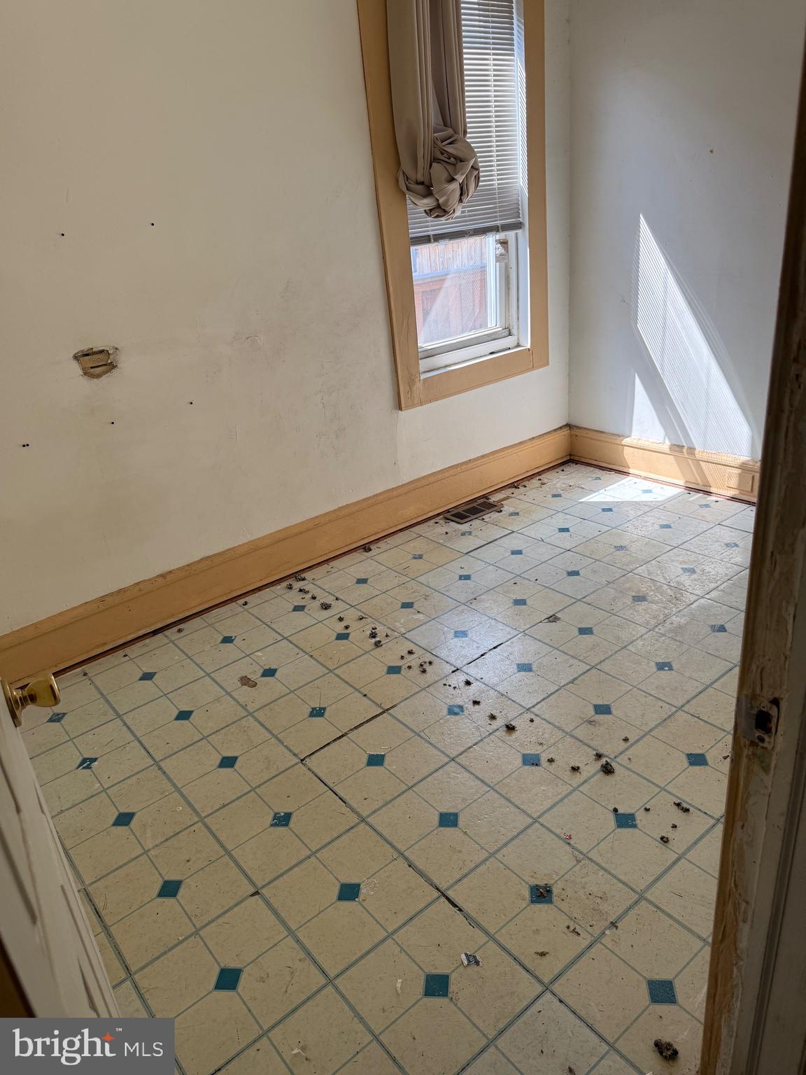 6013 Baltimore Avenue Philadelphia, PA 19143 - Photo 11 of 12 a view of a room with window