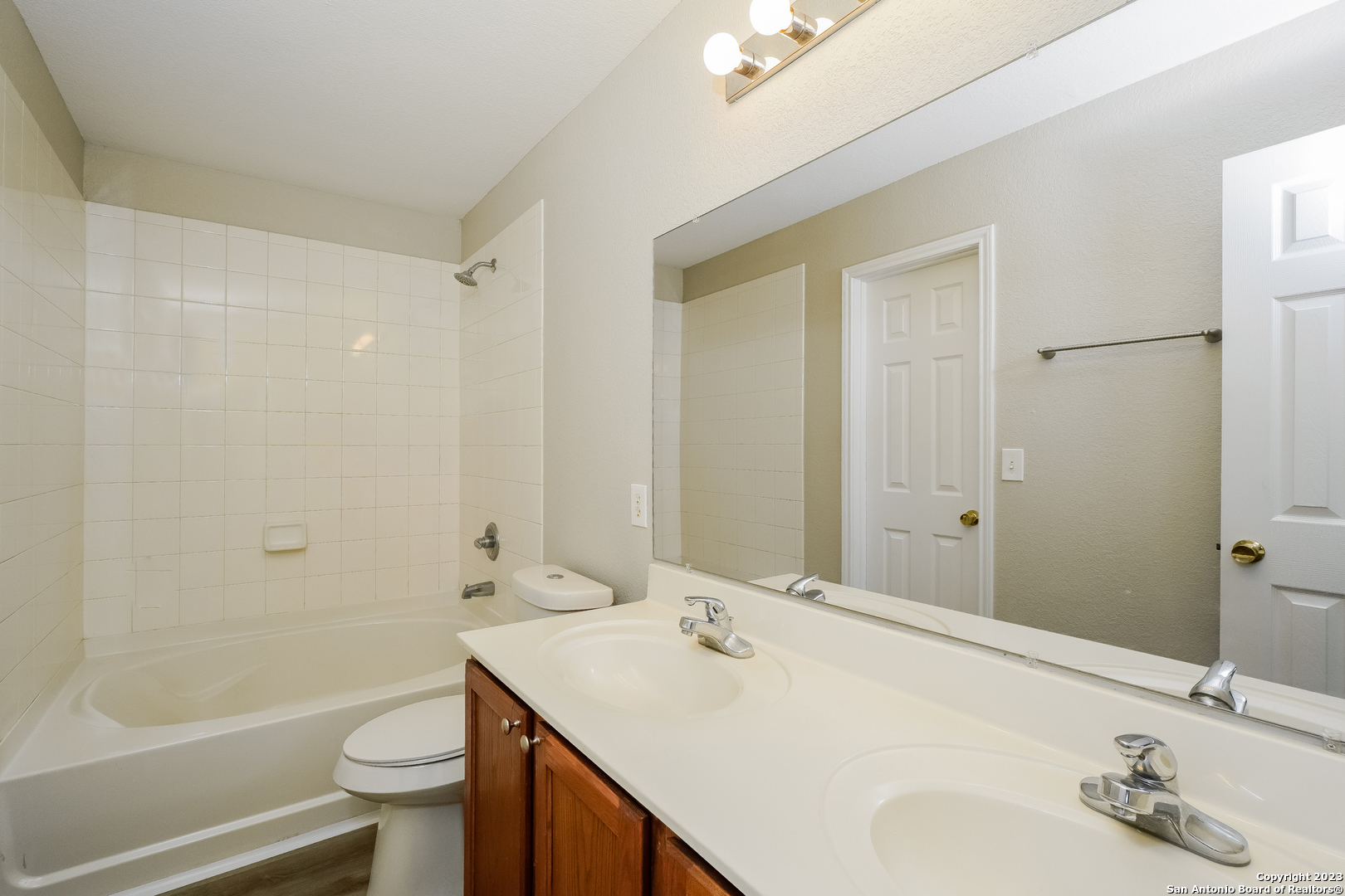 9620 Copper Sands Converse, TX 78109 - Photo 10 of 17 a bathroom with a sink a toilet and shower