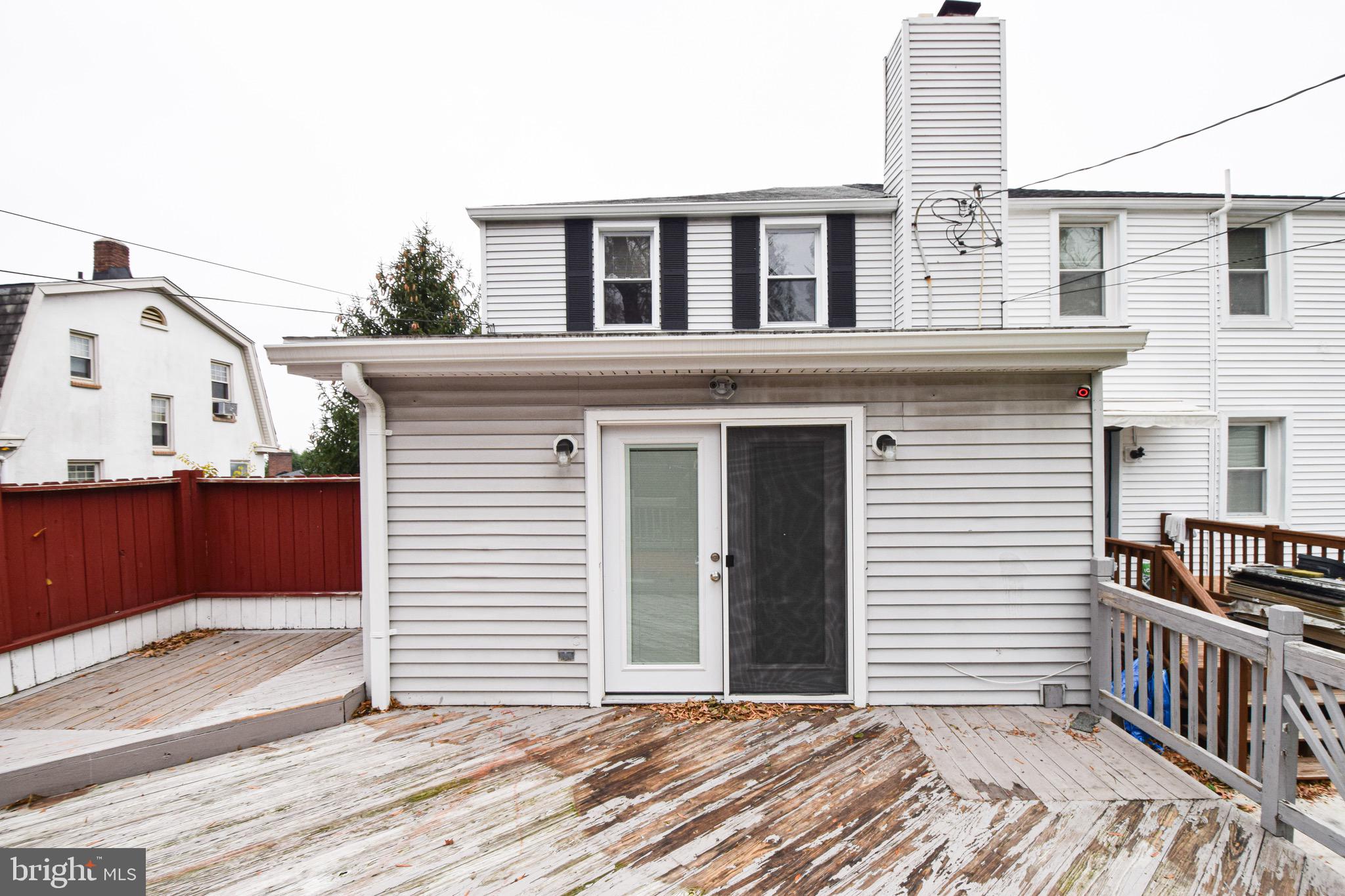 6419 Marietta Avenue Baltimore, MD 21214 - Photo 25 of 38 a view of a house with a balcony