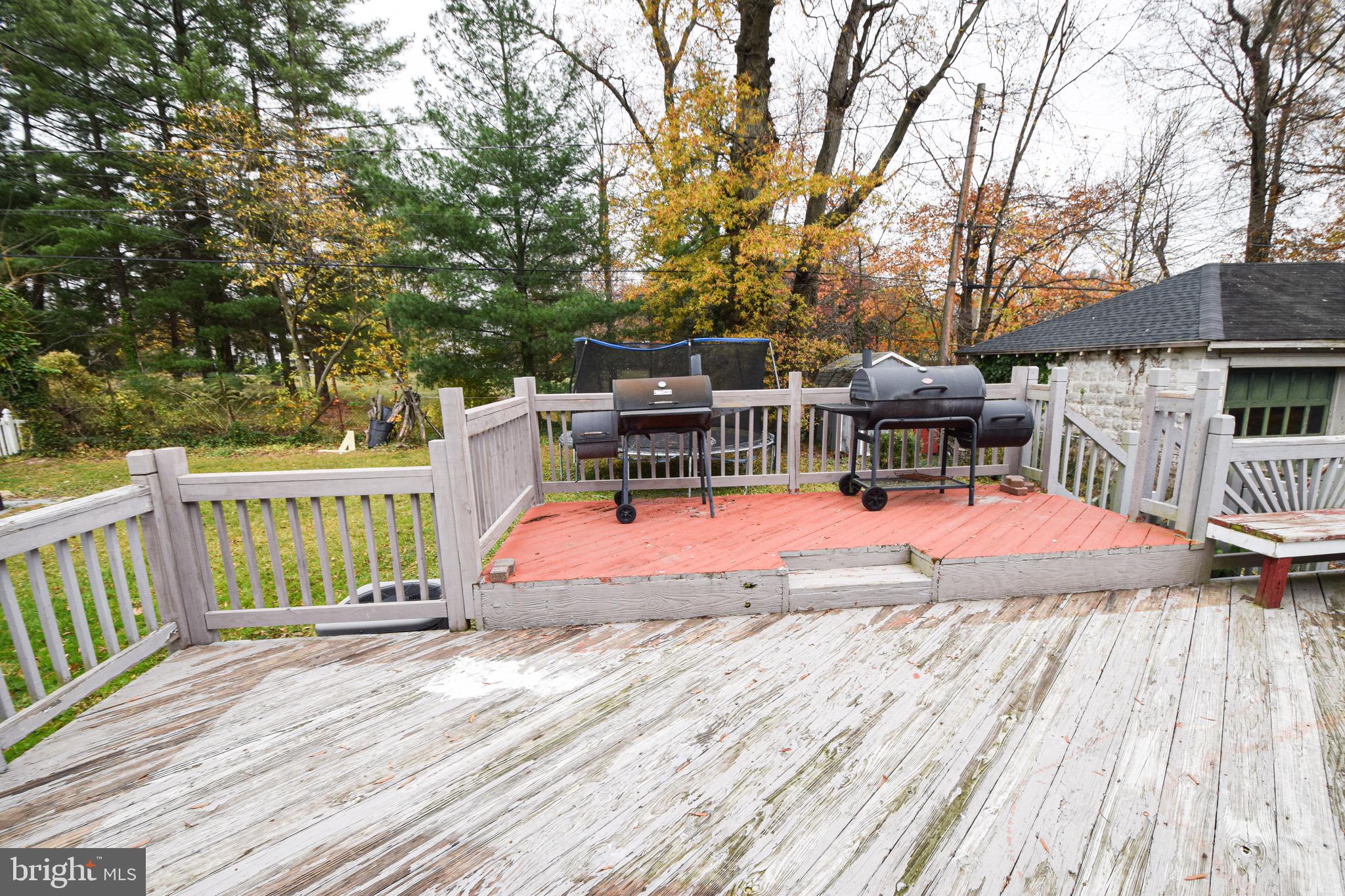6419 Marietta Avenue Baltimore, MD 21214 - Photo 26 of 38 a view of backyard with a deck and wooden floor