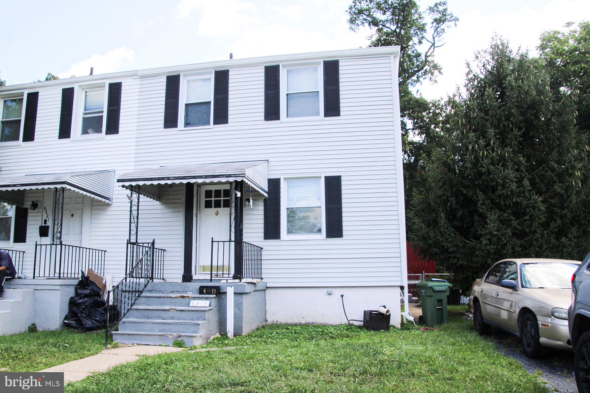 6419 Marietta Avenue Baltimore, MD 21214 - Photo 36 of 38 a view of a house with a yard