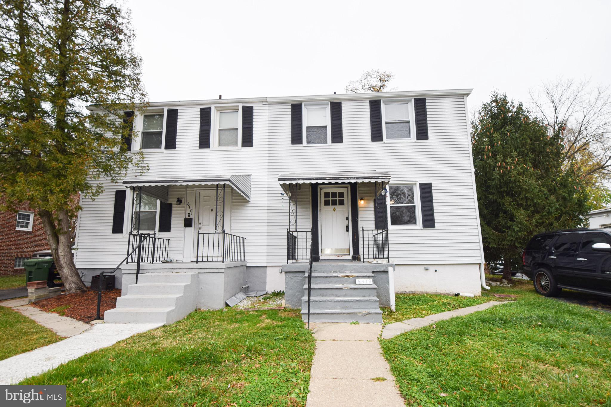 6419 Marietta Avenue Baltimore, MD 21214 - Photo 38 of 38 a front view of a house with a yard